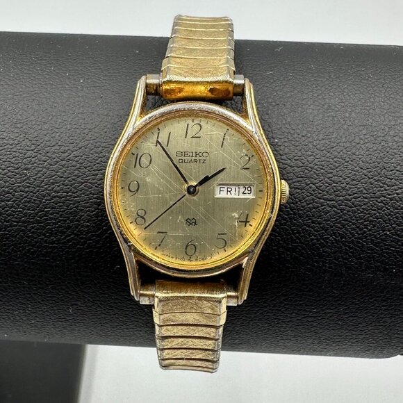 Vintage Seiko Watch Women Gold Tone Day Date Window Stretch Band Working 6.5" - Picture 1 of 11